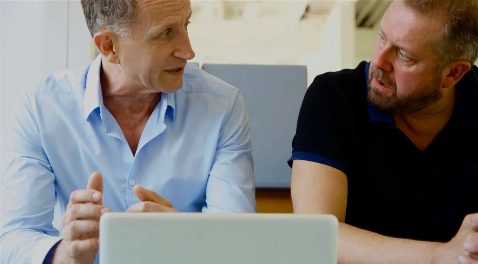 Rod Francis in conversation with a client